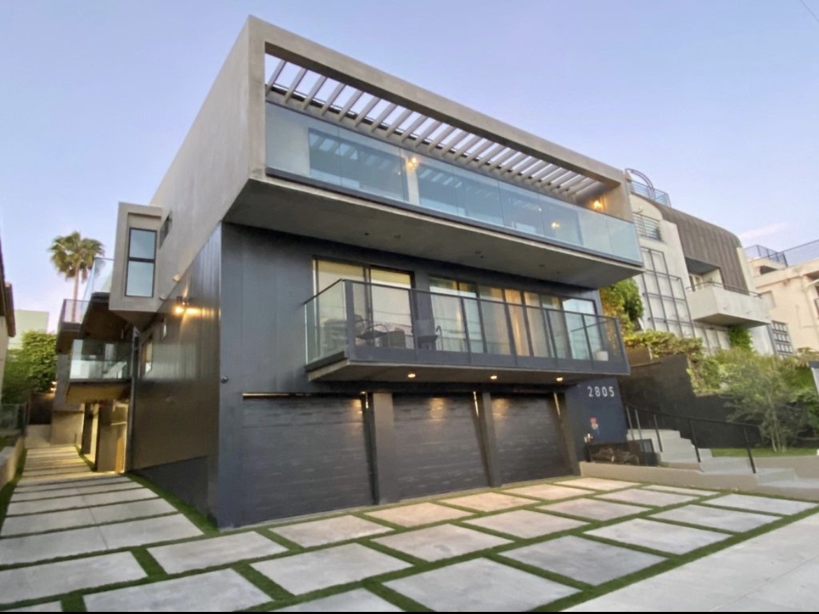 Modern multi-level residential property managed by Aura Property Co. in California